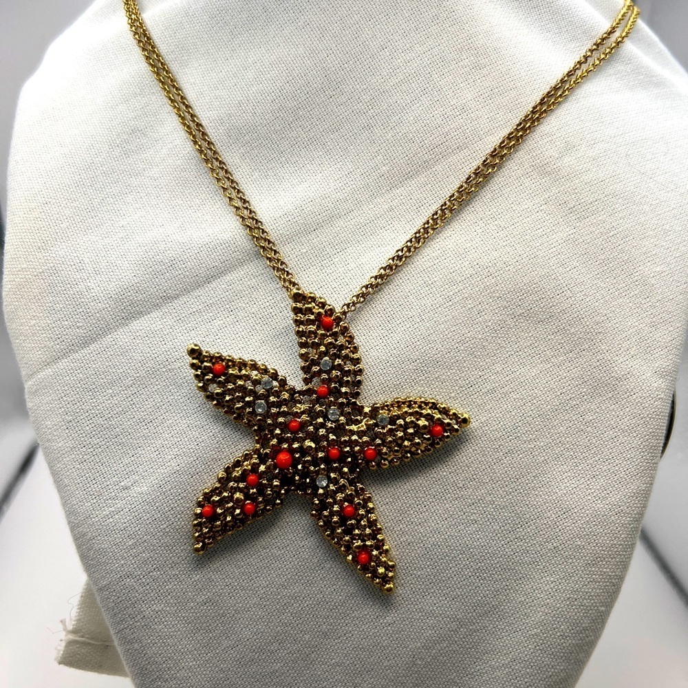 Gold tone Starfish pendant with faux diamonds and coral on a double strand chain